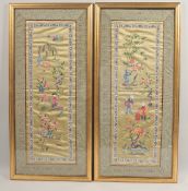 A PAIR OF 20TH CENTURY CHINESE EMBROIDERED SILK PANELS, depicting children playing, 70cm x 33cm.