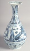 A CHINESE BLUE AND WHITE PORCELAIN VASE, painted with fish and algae, 28cm high.