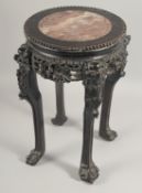A GOOD CHINESE MARBLE INSET HARDWOOD STAND, with carved and pierced frieze and raised on four claw