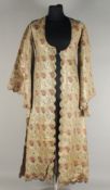 A VERY FINE PERSIAN METAL THREADED SILK ROBE.