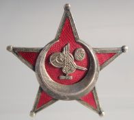 AN ANTIQUE OTTOMAN MEDAL, 5.5cm.
