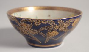A GOOD JAPANESE SATSUMA BOWL, with blue glaze and gilt floral decoration to the exterior, the