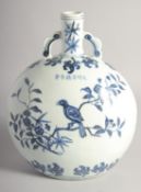 A CHINESE BLUE AND WHITE PORCELAIN TWIN HANDLE MOON FLASK, bearing six-character mark, 28cm high.