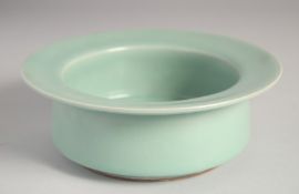 A CHINESE RU STYLE CELADON BRUSH WASHER, 19cm diameter.