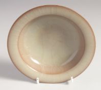 A SMALL CHINESE CRACKLE GLAZE BOWL, 14cm diameter.