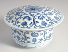 A CHINESE BLUE AND WHITE PORCELAIN BOWL AND COVER, six-character mark to the interior, 19cm