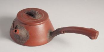 A CHINESE YIXING TEAPOT, with impressed mark to base, 19cm spout to handle.