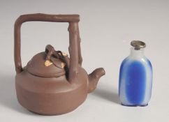 A CHINESE YIXING TEAPOT, (af) 12cm high, together with a glass snuff bottle and stopper, (2).