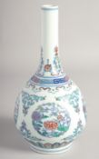 A CHINESE DOUCAI PORCELAIN BOTTLE VASE, six-character mark to base, 26.5cm high.