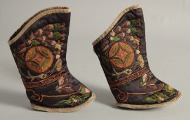 A PAIR OF CHINESE EMBROIDERED FOOT BINDING BOOTS.