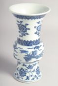 A CHINESE BLUE AND WHITE PORCELAIN GU SHAPE VASE, six-character mark to base, 21.5cm high.