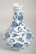 A CHINESE BLUE AND WHITE PORCELAIN BOTTLE VASE, bearing six-character mark, 21.5cm high.
