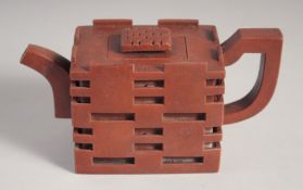 AN UNUSUAL CHINESE YIXING TEAPOT, character mark to base, 16cm spout to handle.