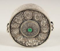 AN ISLAMIC SILVER CIRCULAR BOX, 10.5cm diameter.