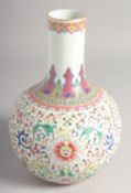 A CHINESE FAMILLE ROSE PORCELAIN VASE, painted with longevity symbol and floral motifs with precious