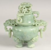 A JADE KORO AND COVER with lion ring handles, surmounted by a dragon, on three claw feet issuing