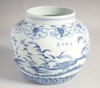 A CHINESE BLUE AND WHITE PORCELAIN JARDINIERE, painted with birds and flora, four-character mark,
