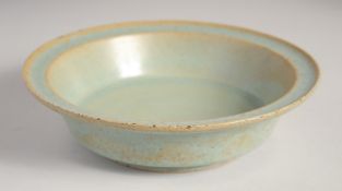 A CHINESE SONG STYLE CELADON BASIN, 22cm diameter.