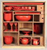 A LARGE COLLECTION OF RED AND GILT LACQUER DINING WARE; including two trays, a large bowl, a serving