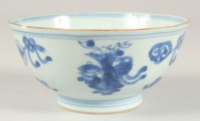 A 17TH/18TH CENTURY CHINESE KANGXI / YONGZHENG BLUE AND WHITE BOWL, decorated with precious objects,