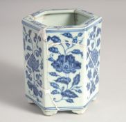 A CHINESE BLUE AND WHITE PORCELAIN HEXAGONAL BRUSH POT, 14cm high, (af).