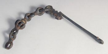 AN ISLAMIC IRON DOOR KNOCKER.