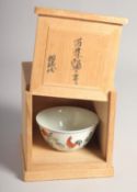 A CHINESE PORCELAIN CHICKEN CUP, six-character mark to base, together with inscribed wooden box.
