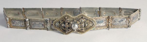 A 19TH CENTURY OTTOMAN TURKISH NIELLO INLAID SILVER BELT, 78cm long.