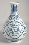 A CHINESE BLUE AND WHITE PORCELAIN YUHUCHUNPING VASE, painted with pomegranate and lotus, bearing