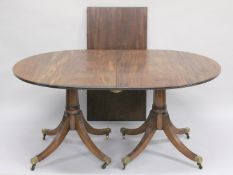 A GEORGE III DESIGN MAHOGANY TWIN PEDESTAL DINING TABLE, comprising a pair of 'D' ends, a single
