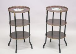 A GOOD PAIR OF 19TH CENTURY CIRCULAR ETAGERE with brass galleries and inset with a porcelain plate