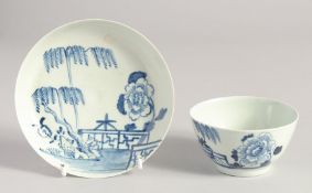 A LIVERPOOL CHAFFERS TEABOWL AND SAUCER painted in blue with a willow, fence and peony.