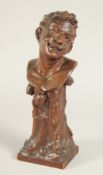 SCHACH AN ART DECO CARVED WOOD BUST OF A MAN ON A PLINTH. W. GOGGS sc. 1914 PAETZ. 14.5ins high.