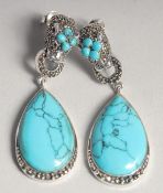 A PAIR OF SILVER MARCASITE PANTHER EARRINGS.