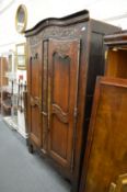 A GOOD 18TH / 19TH CENTURY FRENCH WALNUT TWO DOOR ARMOIRE.