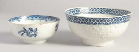 A LIVERPOOL BOWL with reeded decoration and moulded flowers and another BOWL painted with flowers in
