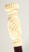 A CARVED BONE HANDLE WALKING STICK 