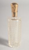 AN 18CT GOLD TOP, CUT GLASS SCENT BOTTLE.