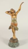 HENRI FUGERE (1872-1944) FRENCH. A BRONZE DANCER. Signed, on a circular marble base. 16.5ins high.