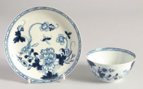 A LIVERPOOL CHAFFERS TEABOWL AND SAUCER painted in blue with a bird on a branch, bears Kitty