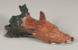 A BRONZE FOX PAPER CLIP. 6ins long.