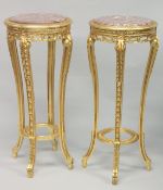 A PAIR OF FRENCH STYLE GILTWOOD AND MARBLE TALL CIRCULAR STANDS. 3ft 8ins high x 1ft 6ins diameter.