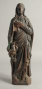 AN EARLY CARVED WOOD FLAT BACKED RELIGIOUS FIGURE. 19.5ins long.