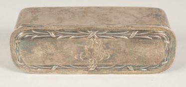 A CHESTER SILVER RECTANGULAR BOX inscribed L. M. 4ins long. Chester 1909.