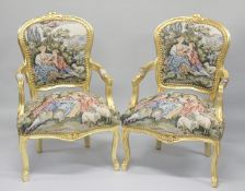 A PAIR OF FRENCH STYLE TAPESTRY UPHOLSTERED GILT WOOD OPEN ARMCHAIR.