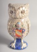 A LARGE ITALIAN POTTERY OWL with LOOSE HEAD on a blue base. 10ins high, (head A/F).