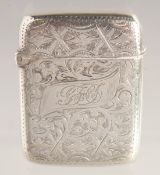 A VICTORIAN ENGRAVED SILVER VESTA. 1.75ins x 1.25ins. Birmingham.