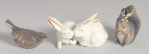 TWO ROYAL COPENHAGEN RABBITS, No. 517, 4ins long, a SQUIRREL, No. 98 2ins high and a BIRD, No. 1506,