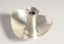 A SMALL MODERNIST SILVER CANDLESTICK. 2ins high, London 1902.
