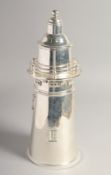 A SILVER PLATED LIGHTHOUSE COCKTAIL SHAKER. 14ins high.